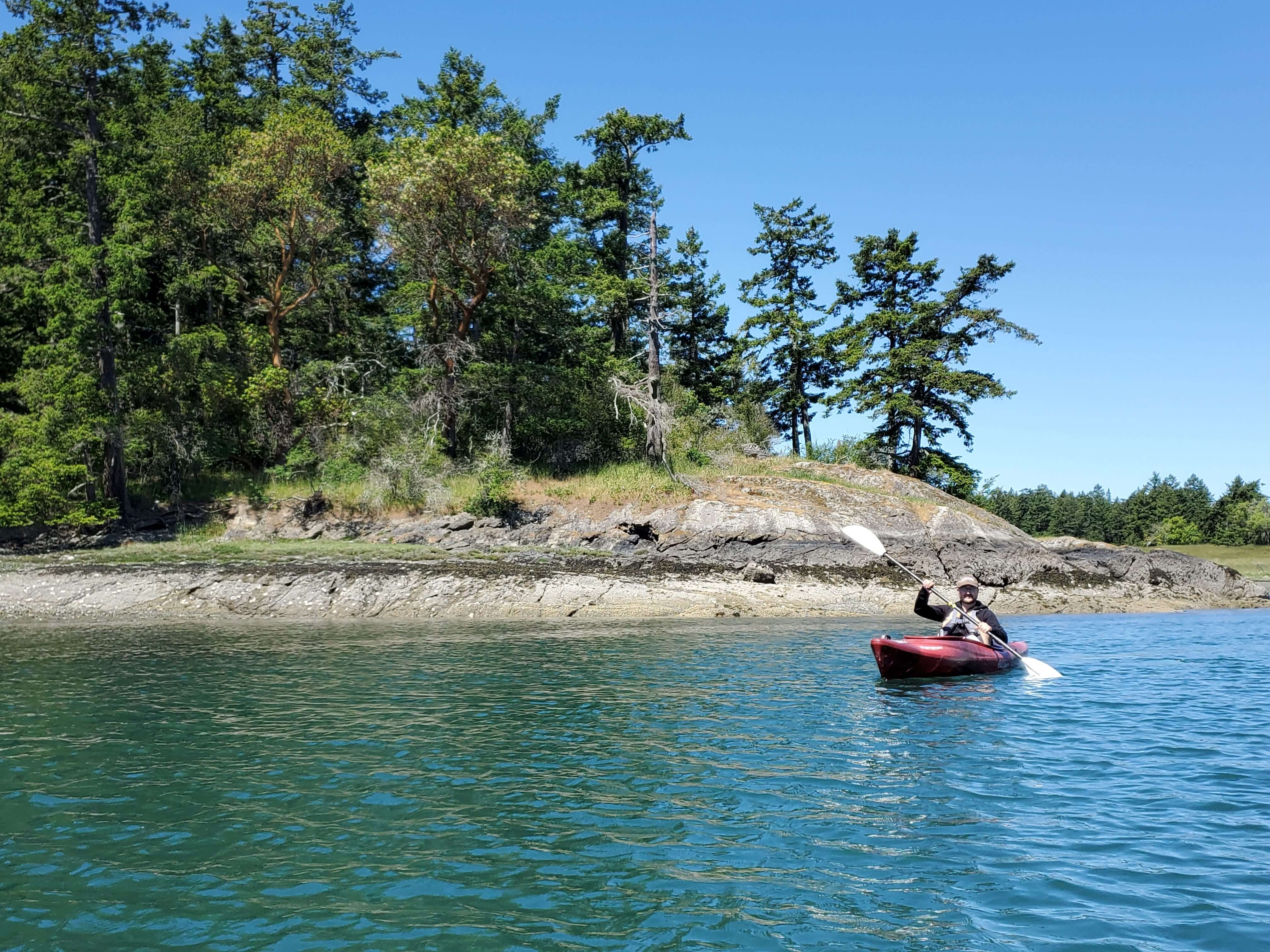 A kayaker in Fisherman Bay off of Lopez Island