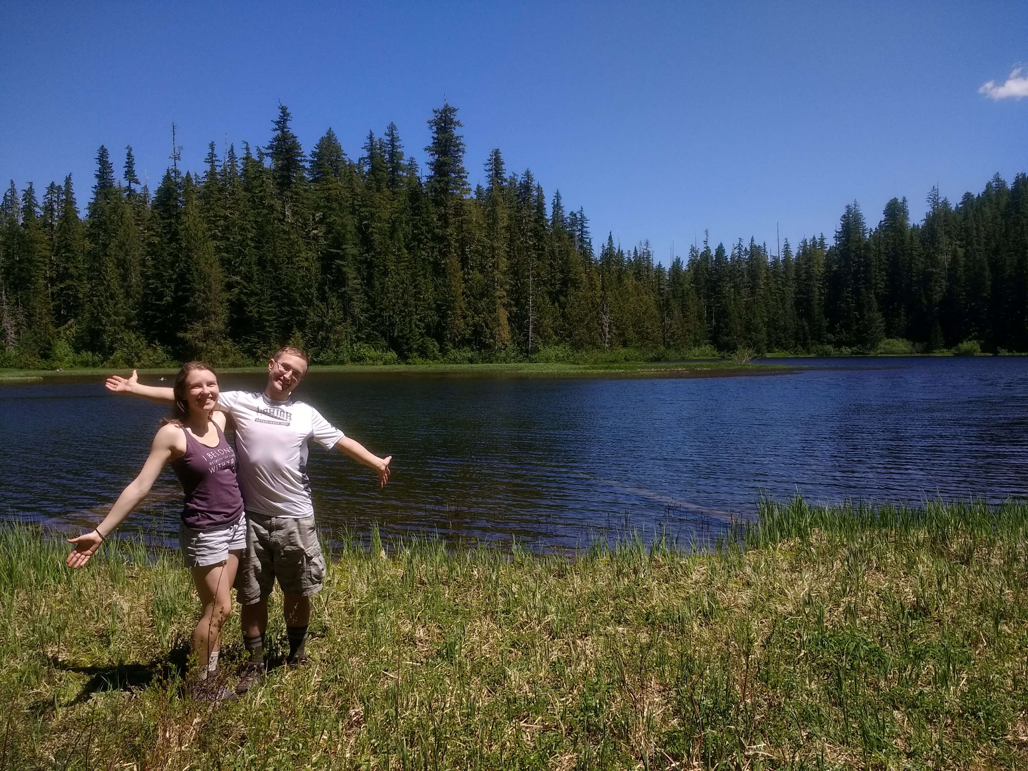 Hikers posing at Mink Lake in Olympic National Park