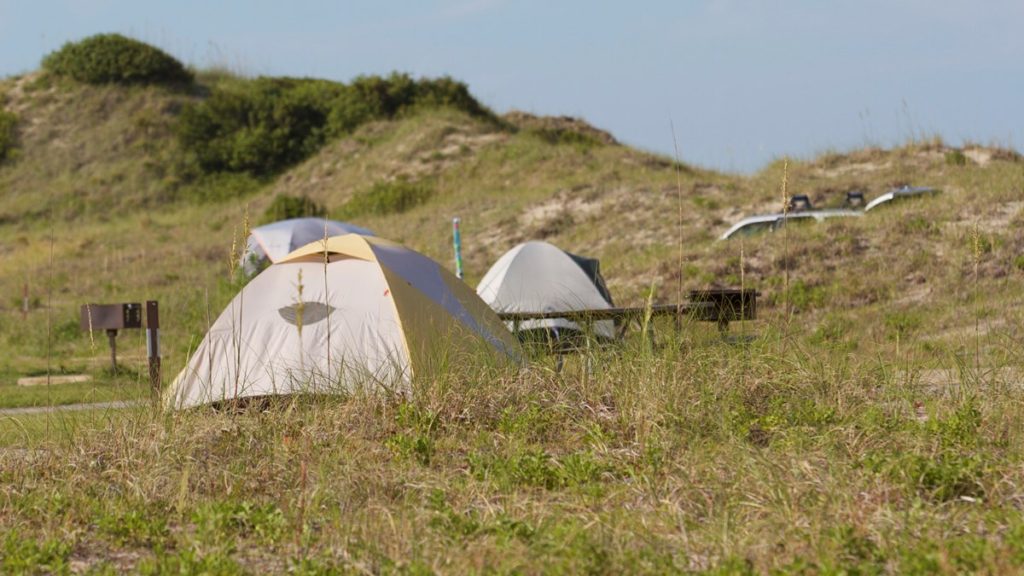 Tents near dunes at Oregon Inlet Campground, Cape Hatteras National Seashore