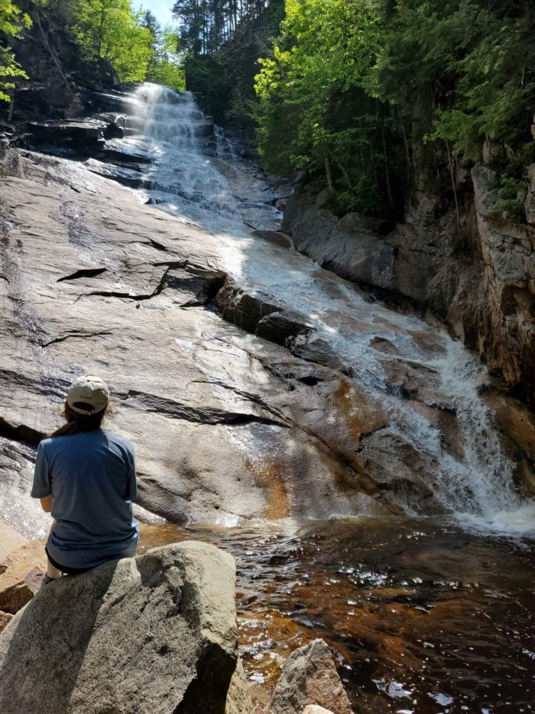 Hiker at Ripley Falls in the White Mountains