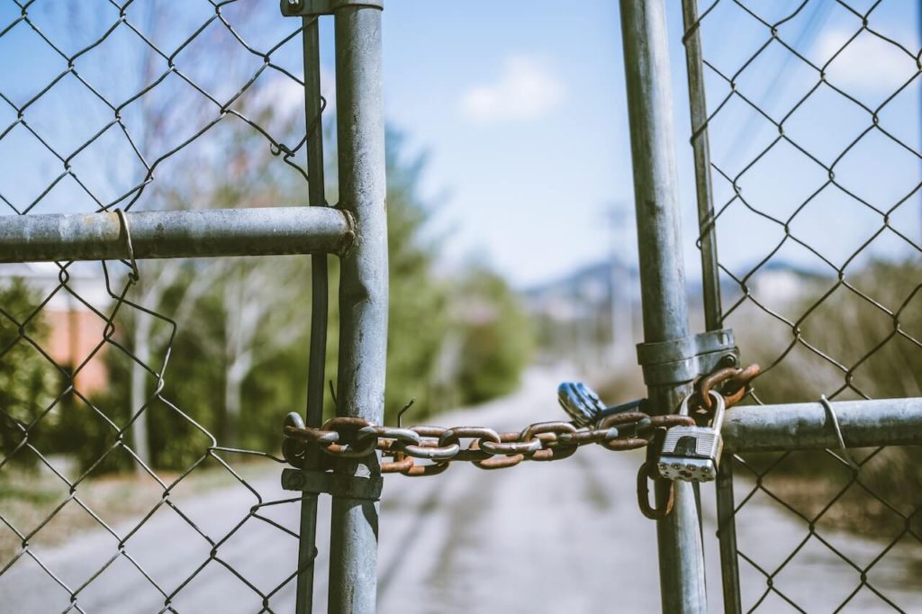 A locked chain link gate