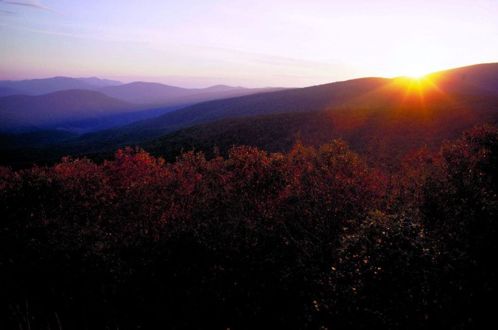 Sun rises over the Blue Ridge Mountains in Shenandoah National Park